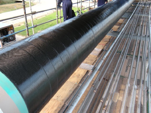 A long section of pipe wrapped in HydraWrap for protection