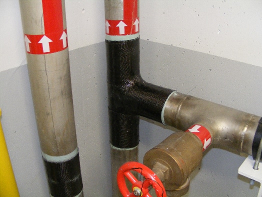 HydraWrap applied to multiple pipes for protection