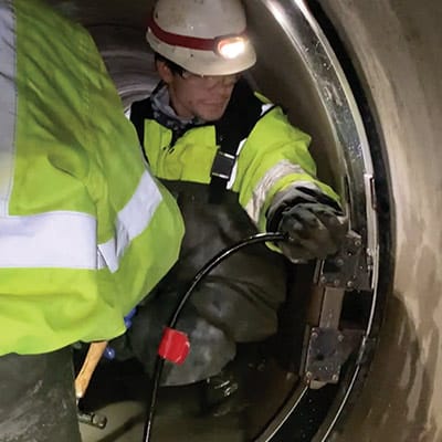 Field Service Technician Installing HydraTite