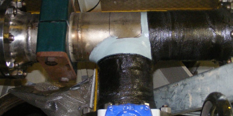 HydraWrap protecting the exterior of a tee pipe