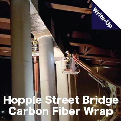 Field Services Technicians applying a carbon fiber wrap. 'Hopple Street Bridge Carbon Fiber Wrap'