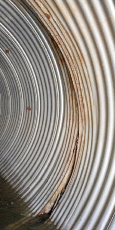 Exposed joint in a corrugated pipe