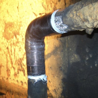 A pipe bend that has been strengthened with HydraWrap