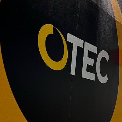 close up of the OTEC Logo