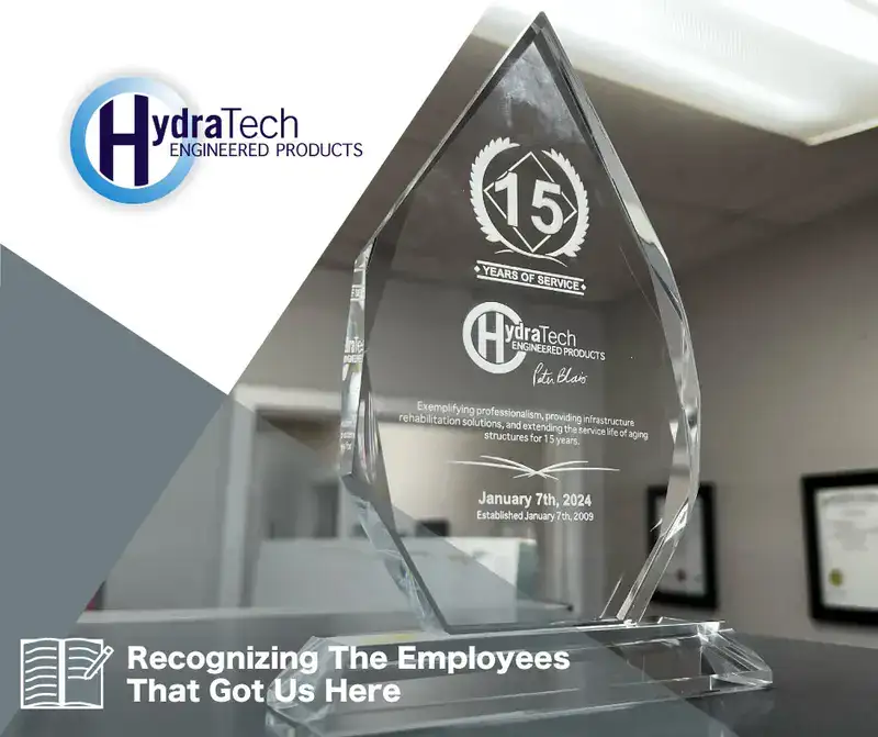 A glass award, 'Recognizing The Employees That Got Us Here'