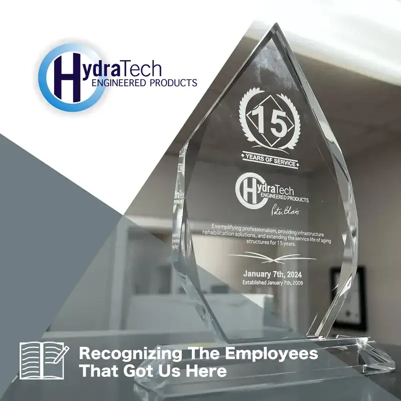 A glass award, 'Recognizing The Employees That Got Us Here'