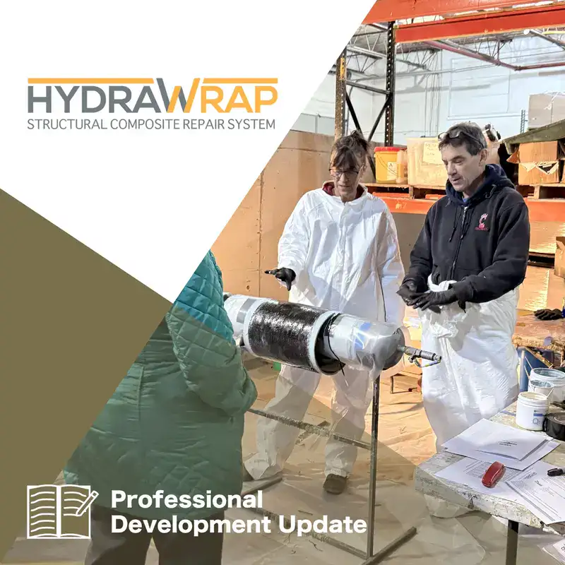 Office employees learning about HydraWrap, 'Professional Development Update'