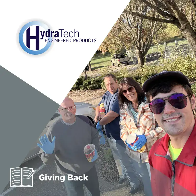 A Group Of Employees On A Community Service Day3 A test pipe wrapped in carbon fiber fabric, 'How To Install HydraWrap'