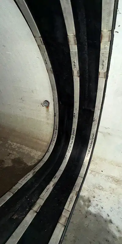 A HydraTite seal installed over a joint in an irregularly-shaped pipe