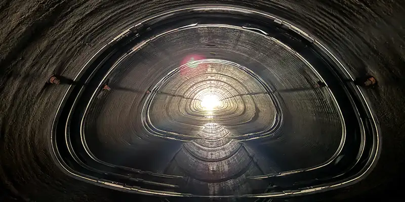 Several HydraTite seals installed over joints in an irregularly-shaped pipe