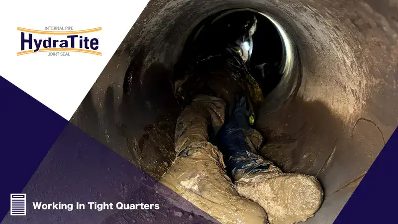 A technician in a small-diameter pipe installing HydraTite, the internal pipe joint seal, over a joint to fortify it against leaks, 'Working In Tight Quarters'