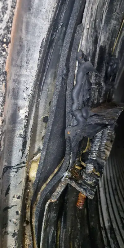 Previous repair that will be replaced with HydraTite to properly repair the pipe