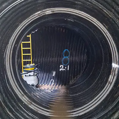 HydraTite installed over a joint in a corrugated pipe to prevent leaks