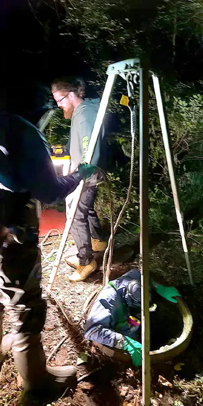 A lowering system for technicians safely entering a pipe