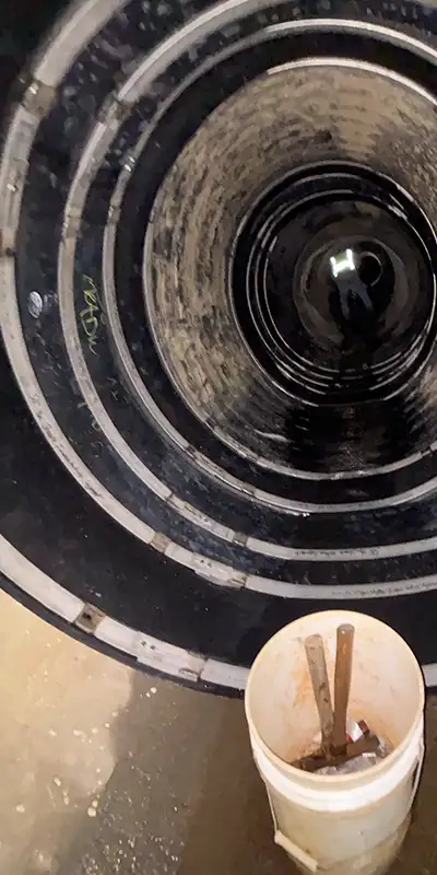 Two sleeves of three interlocked HydraTite seals installed over a pipe transition between a corrugated metal pipe to concrete pipe