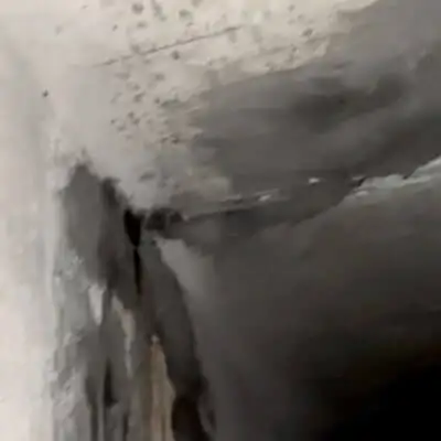 A corner of a box-shaped flume with concrete patches
