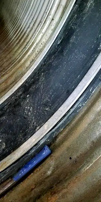 A HydraTite seal installed over a joint in a corrugated metal pipe