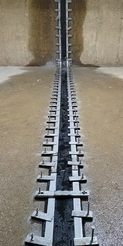A large joint sealed utilizing HydraTite in a massive water basin