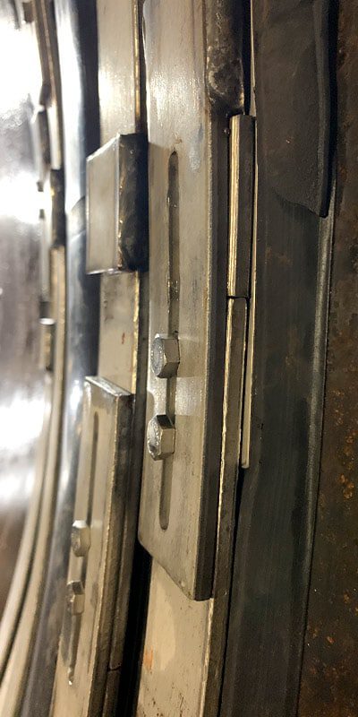 HydraTite installed over a joint in a large-diameter metal pipe