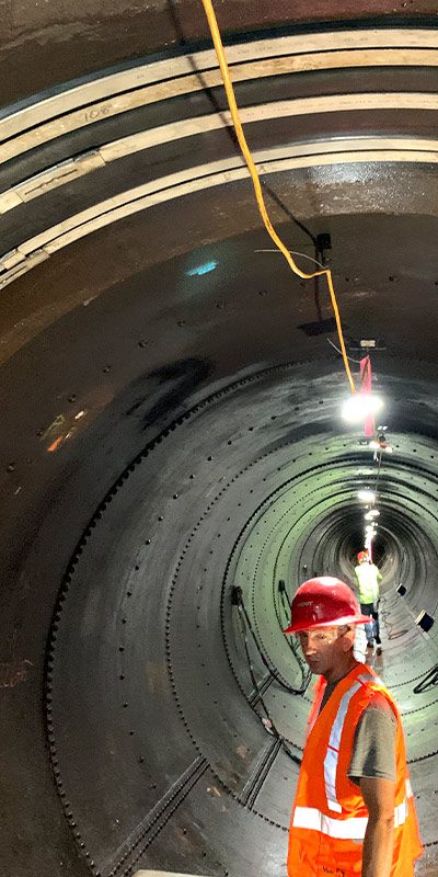 HydraTite seals being installed inside a large-diameter penstock pipe