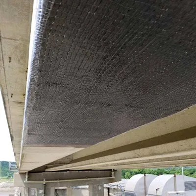 Carbon fiber composite applied to the underside of a bridge to reinforce it