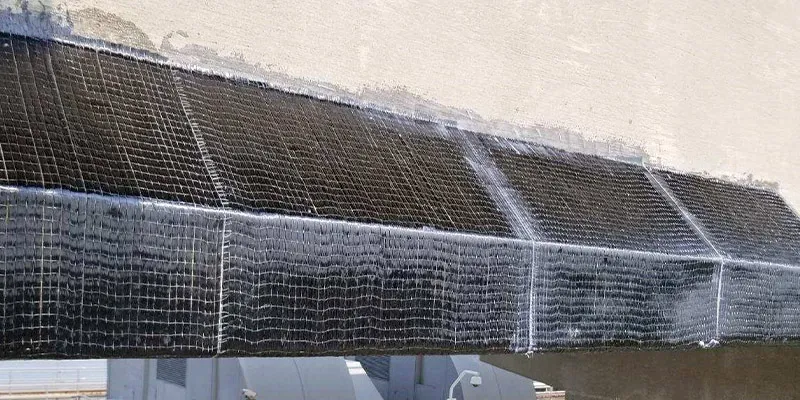 Carbon fiber composite applied to the underside of a bridge to reinforce it