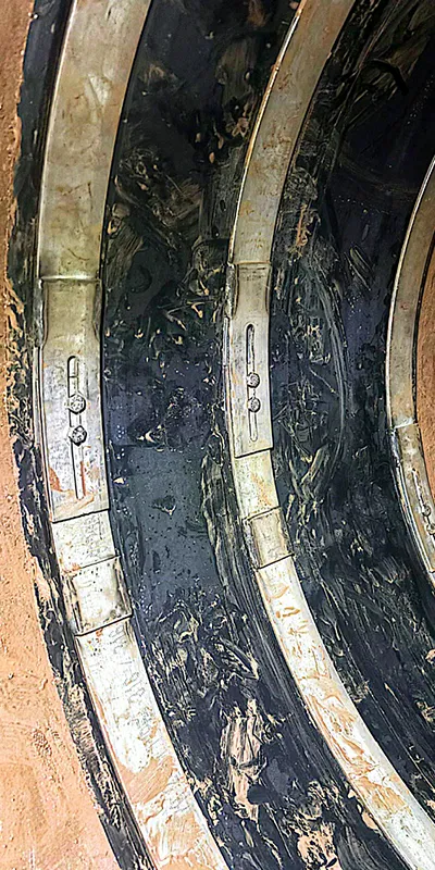 A large-diameter pipe being sealed with a double-wide HydraTite seal