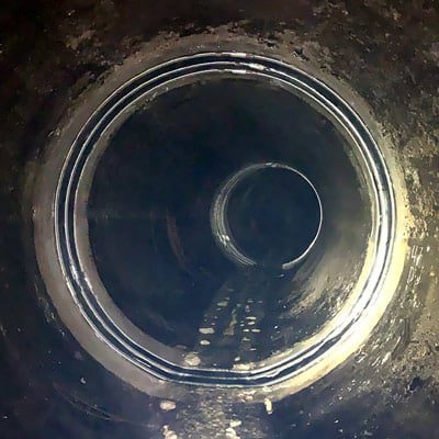 HydraTite installed over a joint in a water treatment pipe