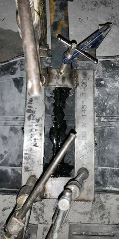 Rubber being bonded on site during a HydraTite repair