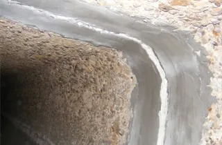 A joint in an irregularly-shaped trestle pipe