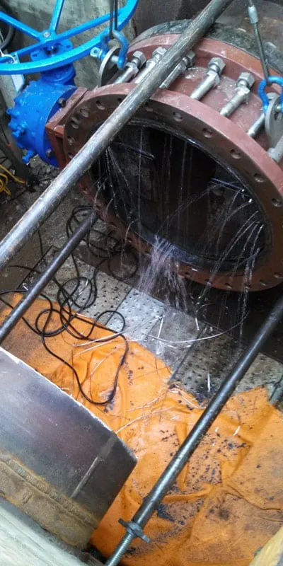 An opening to a 30" pump suction line