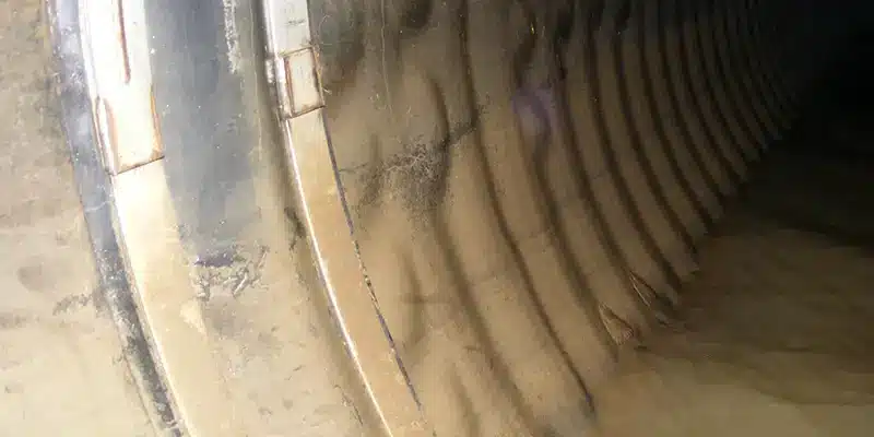 A muddy internal pipe joint seal protecting a joint