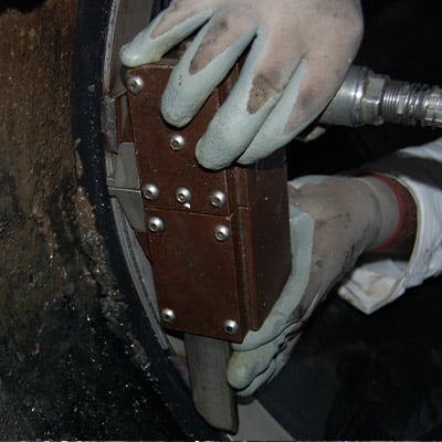 Holding an expander in place while installing HydraTite
