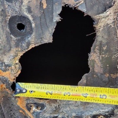 A damaged portion of HDPE
