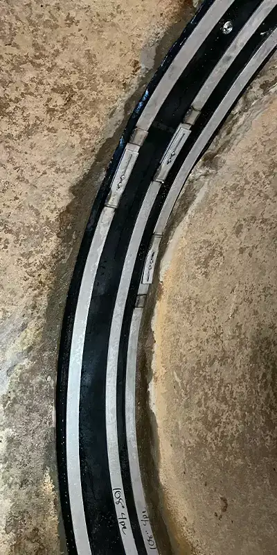 A HydraTite seal installed over a joint in a large-diameter pipe at a power plant