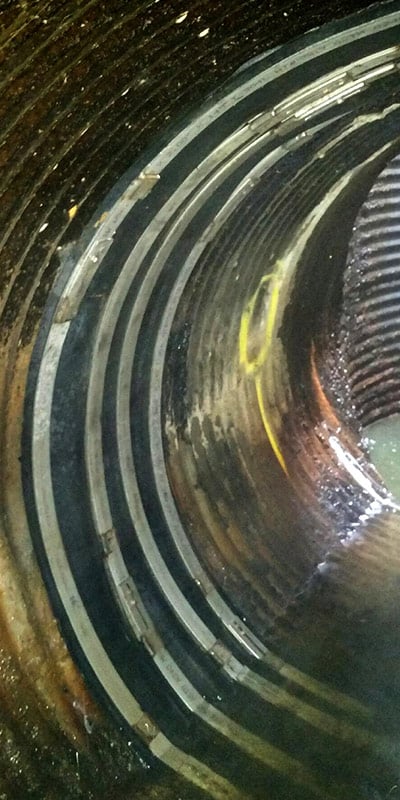 HydraTite Installed Over A Joint In A Corrugated Overflow Pipe
