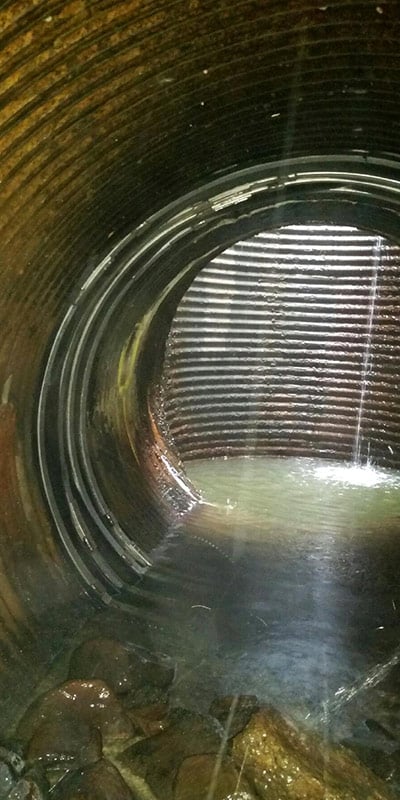 HydraTite Installed Over A Joint In A Corrugated Overflow Pipe