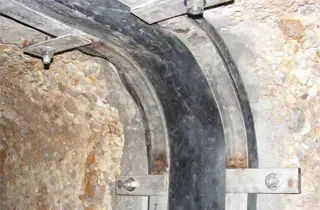 HydraTite installed in an irregularly-shaped trestle pipe