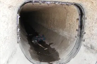 HydraTite installed in an irregularly-shaped trestle pipe