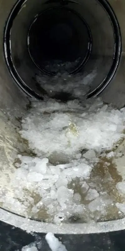 HydraTite installed over a joint in a pipe that has ice on the invert