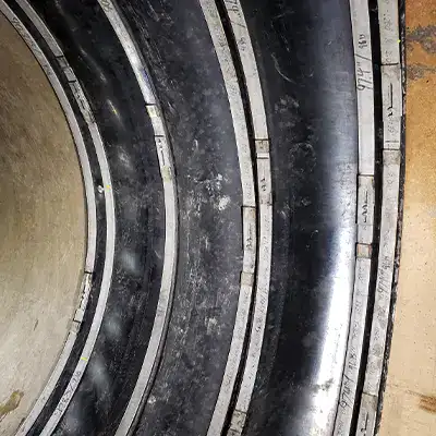 Three interlocking seals installed as a sleeve over a large repair area