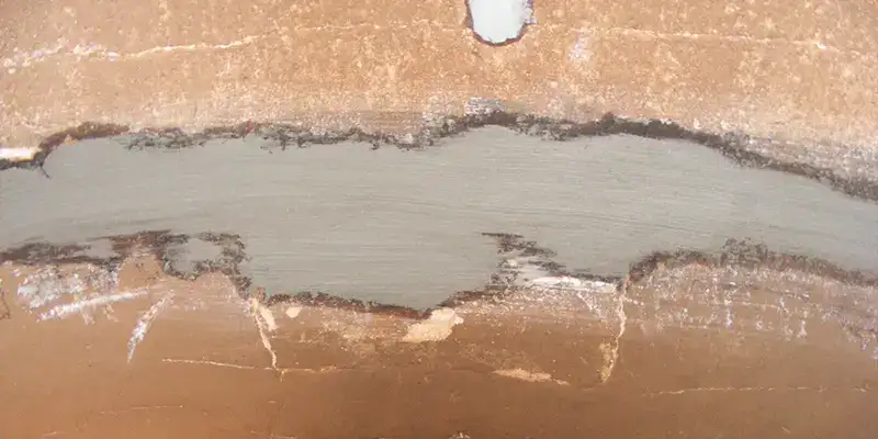 Concrete patch inside a large-diameter pipeline