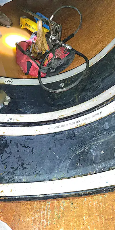 HydraTite seal installed with four retaining bands in a pipe