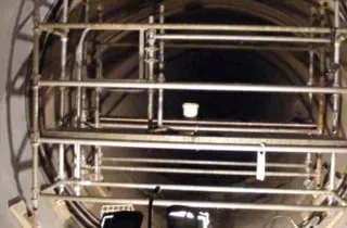 Scaffolding set up near a joint in a 120-in recirculating cooling line