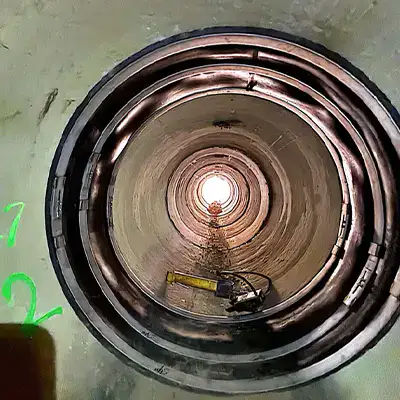 HydraTite sealing a joint in a circular DOT culvert to seal the pipe
