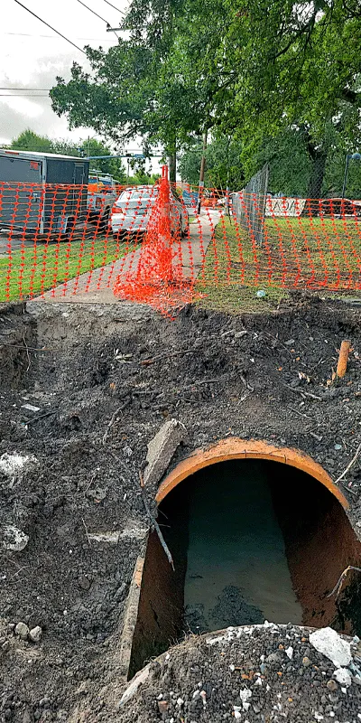A pipe that has been dug down to and opened