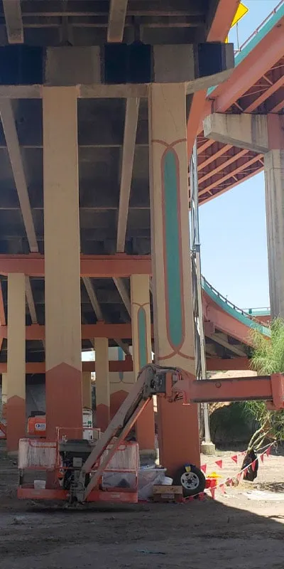 Portions of a bridge's supports wrapped in carbon fiber wrap