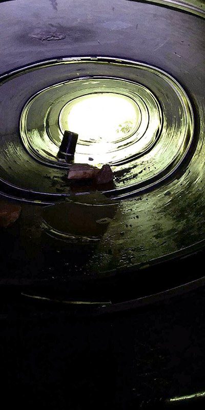 A long elliptical-shaped concrete culvert sealed with HydraTite at the joint