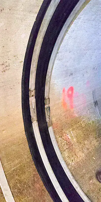 A HydraTite seal installed over a joint on the inside of a pipe