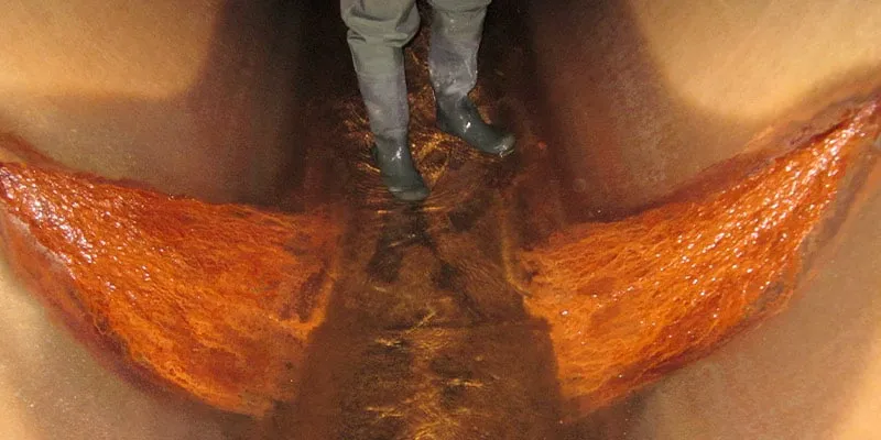A joint of a pipe where infiltration is entering the invert of a pipe